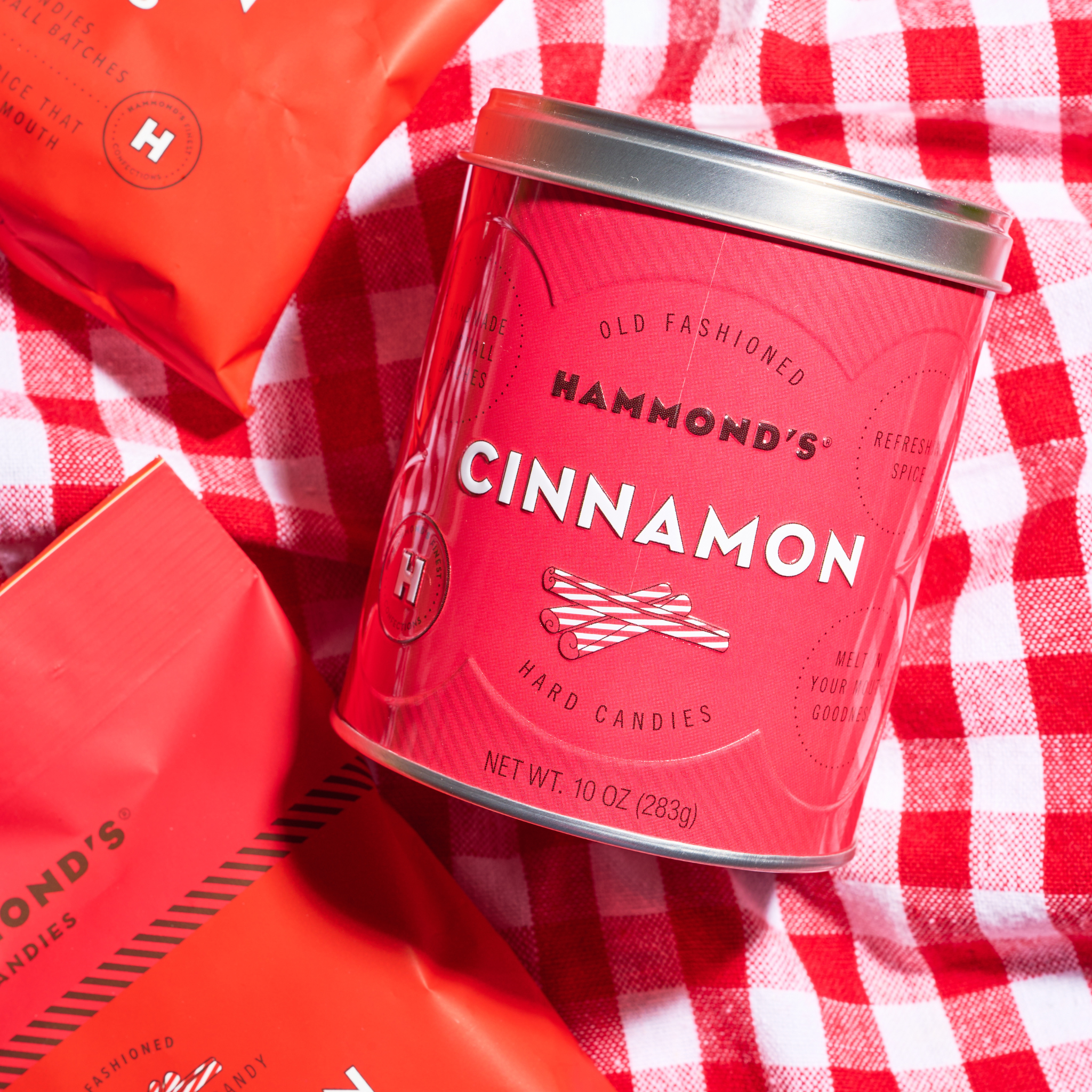 Cinnamon Drop Tin and Bag on checkered tablecloth