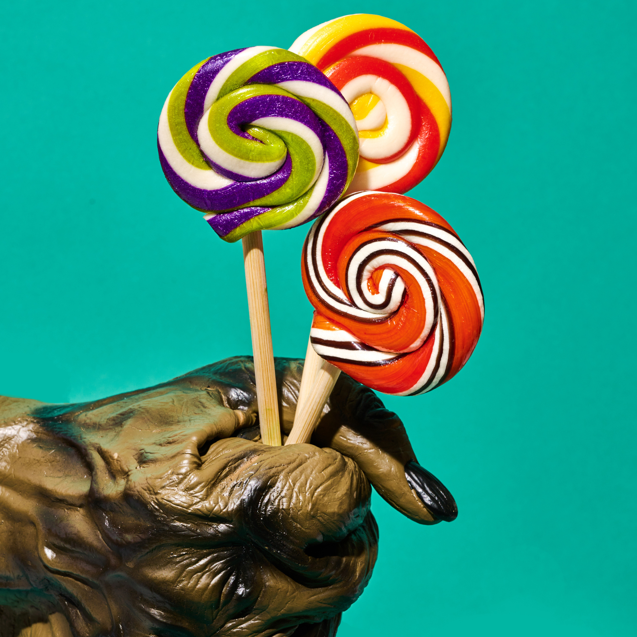lollipops with monster hand