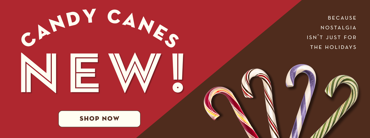 Holiday promotional banner with the words 'CANDY CANES NEW!' on a red background, a 'SHOP NOW' button, and several illustrated candy canes on a dark brown background with the tagline 'BECAUSE NOSTALGIA ISN'T JUST FOR THE HOLIDAYS'.